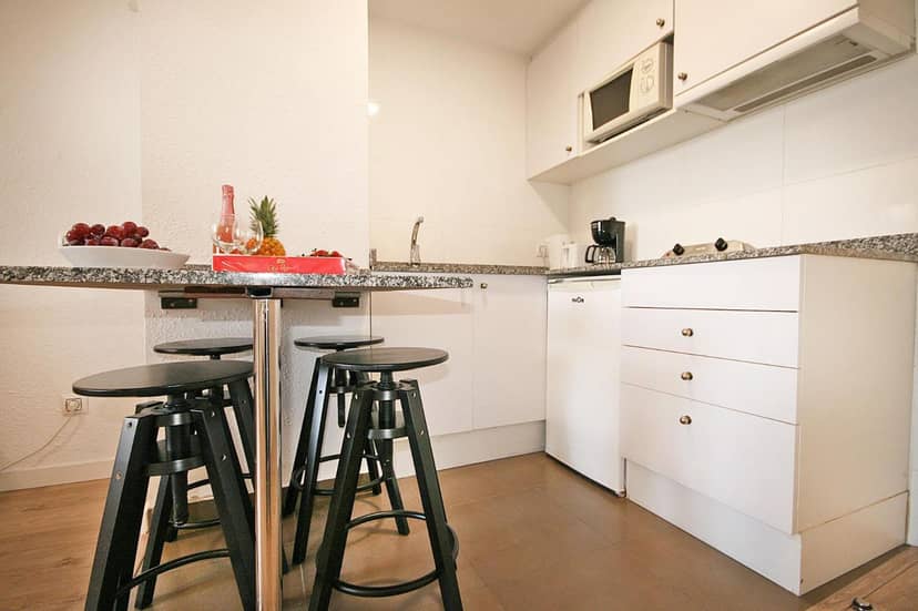 Apartamentos Venecia — kitchen
