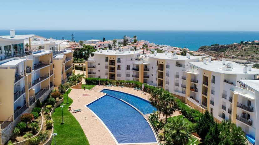 BnB Homes Ocean view Apartment with huge sunny Terrace, 2 Swimming pools & Tennis court — building