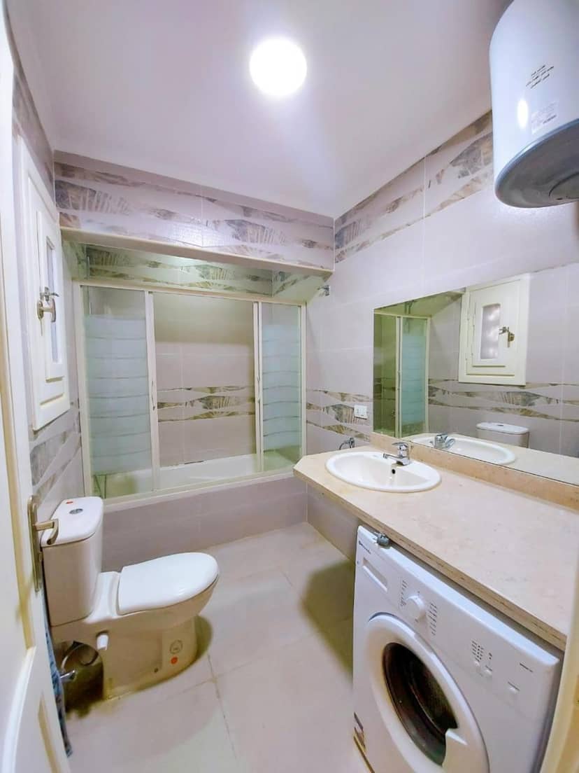 lovely one bedroom apartment within cozy compound including swimming pool, supermarket. perfect location at neama Bay with access to public transportation — bathroom