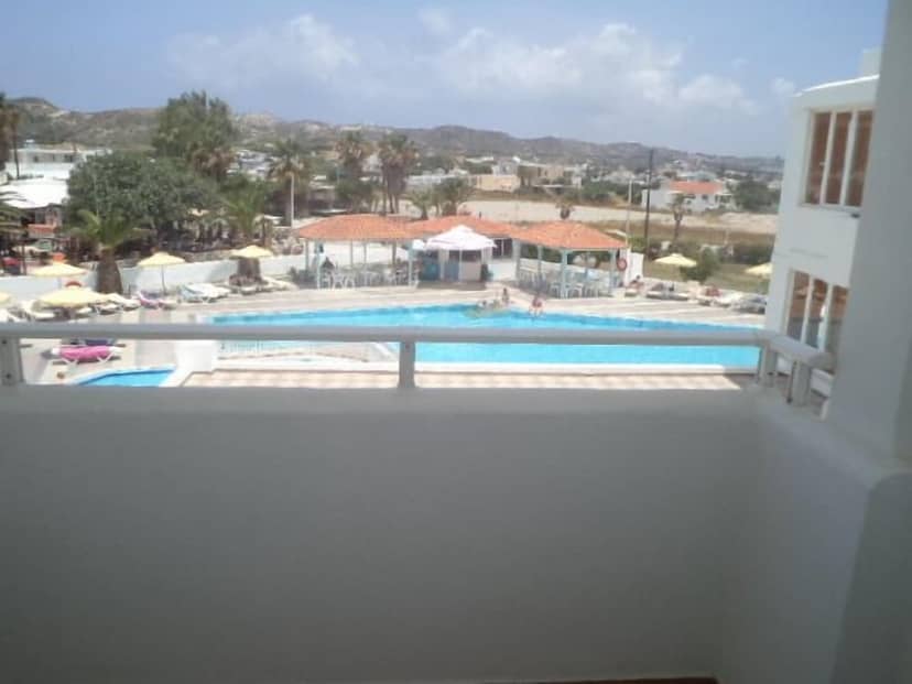 Kamari Bay Hotel — balance & terrace